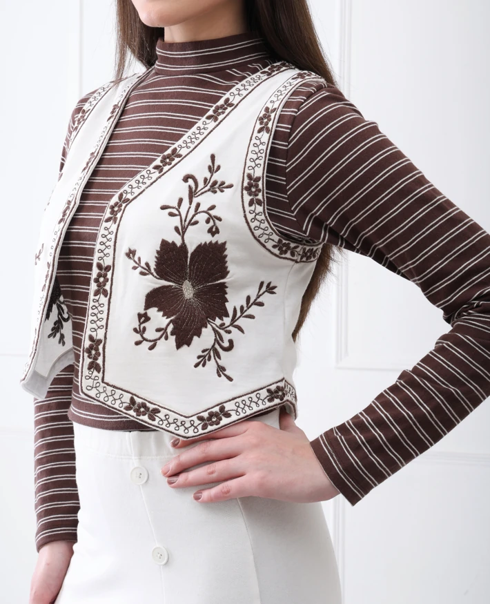 Striped turtleneck with embroidered vest, fast production turnaround